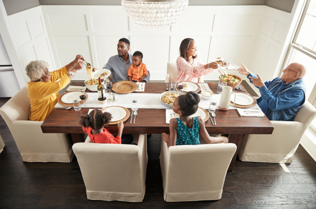 Happy family enjoying break fast | Hernandez Wholesale Flooring